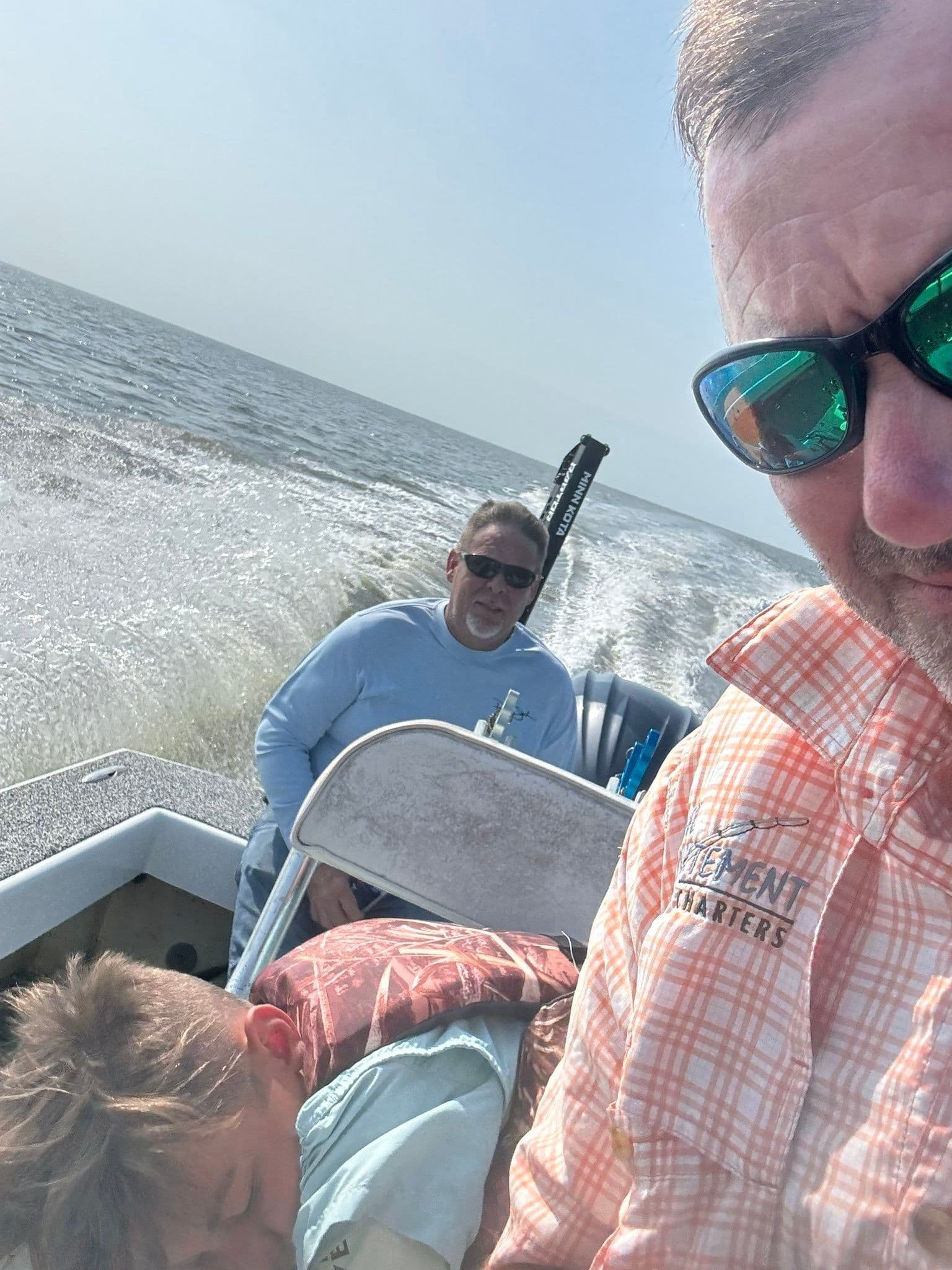 Enjoying a beautiful day out on the water with Reel Excitement Charters! Looks like someone is catching some Z's after a fun day.