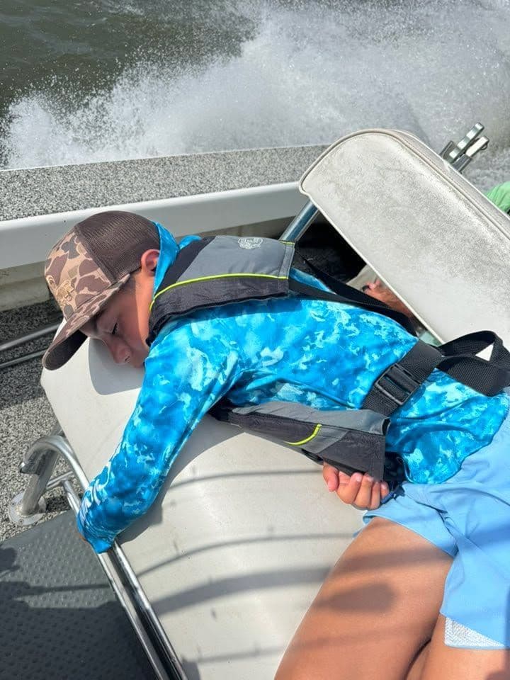 Even the most exciting fishing trips can lead to a little naptime! This young angler is catching some Z's after a fun day on the water. We love seeing our guests, big and small, enjoy their time with Reel Excitement Charters.